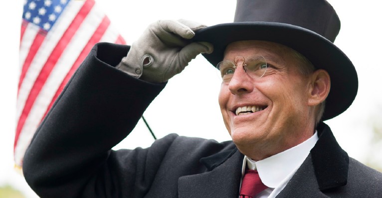 JUDD BANKERT – Actor, educator, and former Olympics athlete, will perform as President Woodrow Wilson, and greet students in the year of Romania’s Great Union Centennial